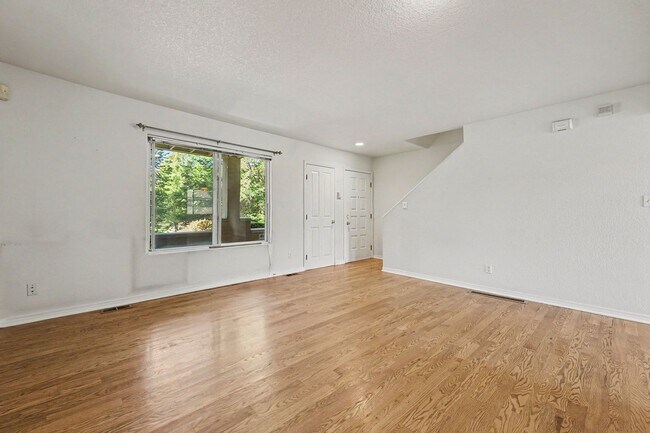 Building Photo - Beautiful 2BR Townhome in Gated Community with 2-Car Garage