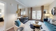 Located at 440 Cane Hill Rd in Antioch, Tennessee, this one-bedroom, one-bathroom unit offers a thoughtfully designed single-floor layout with a comfortable and modern living experience. The open-concept kitchen and living room serve as the heart of the home, featuring hardwood-style flooring, crown molding, and large French doors that flood the space with natural light and open to a private patio overlooking the community grounds. The kitchen is well-equipped with white shaker cabinetry, granite countertops, a subway tile backsplash, and a full suite of stainless steel appliances including a gas range, microwave, dishwasher, and refrigerator. The adjacent dining area provides a welcoming space for everyday meals. The living room offers generous proportions with neutral tones and crown molding details that lend a polished feel throughout. The bedroom is a serene retreat, complete with plush carpet, a ceiling fan, a large window, and direct access to the bathroom. The full bathroom features large-format tile flooring, a shower-tub combination, and an adjoining walk-in closet with built-in shelving, offering practical storage. The unit's overall aesthetic is clean, contemporary, and inviting.