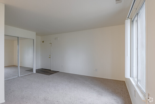 1BR, 1BA Living Room - Grand Plaza