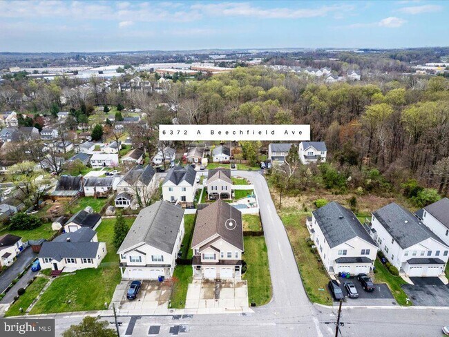 Building Photo - 6372 Beechfield Ave