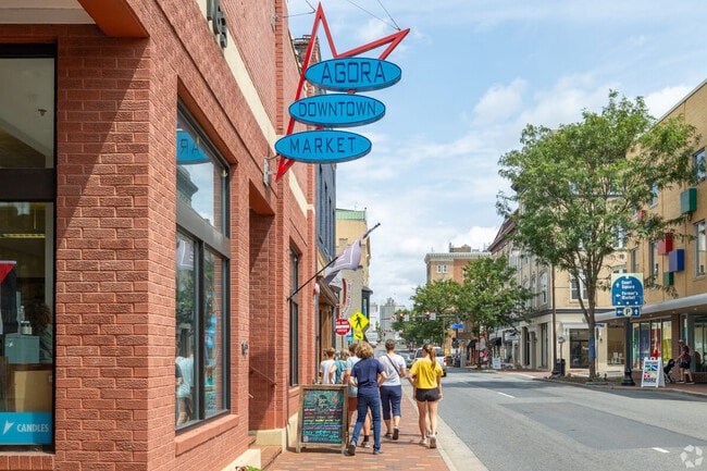 People peruse local businesses in Downtown Harrisonburg.