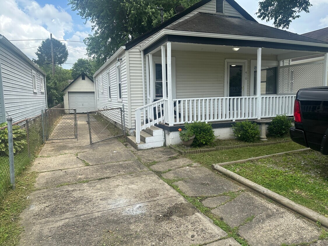 Front Entrance - Garage and Few parking spots off street. Fenced backyard - 410 Abney St