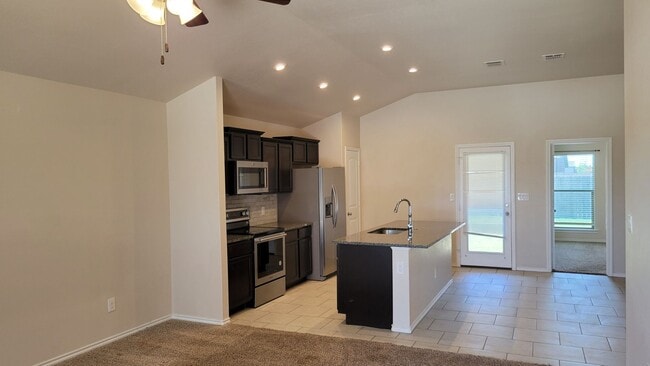 Building Photo - This Beautiful Brand New Custom Brick Home 3 bed/ 2 bath/ 2 car garage Open Concept with huge bac...