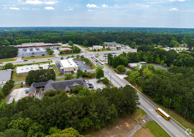 Mature trees cover the yards and lots throughout all of Ellenwood.