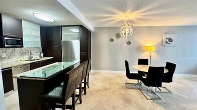 Building Photo - 19390 Collins Ave