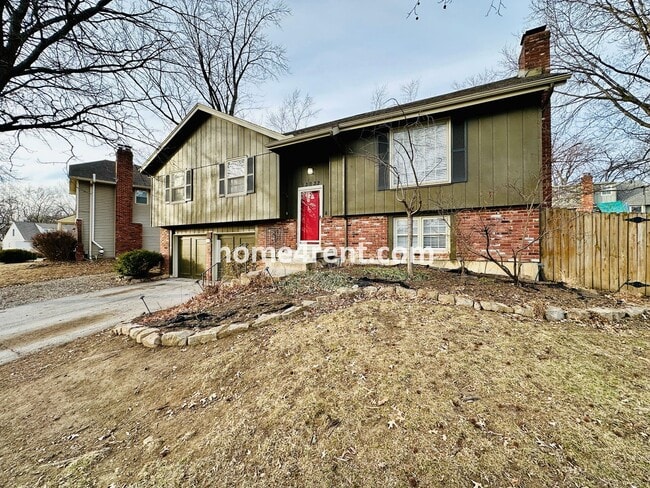 Building Photo - A Lovely Four Bedroom Home in Lenexa w/ Wood Floors, Finished Basement and a Fenced Yard!