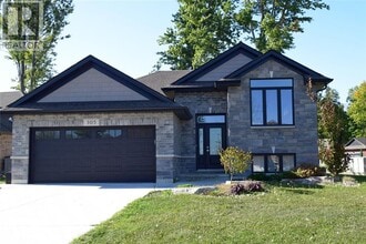 Building Photo - 305 Timtam Ct