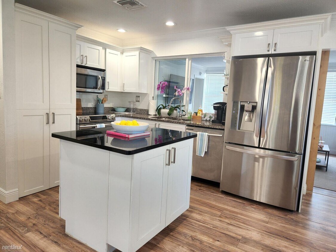 Foto principal - 3 br, 2.5 bath House - 6211 Lake Ave # 1