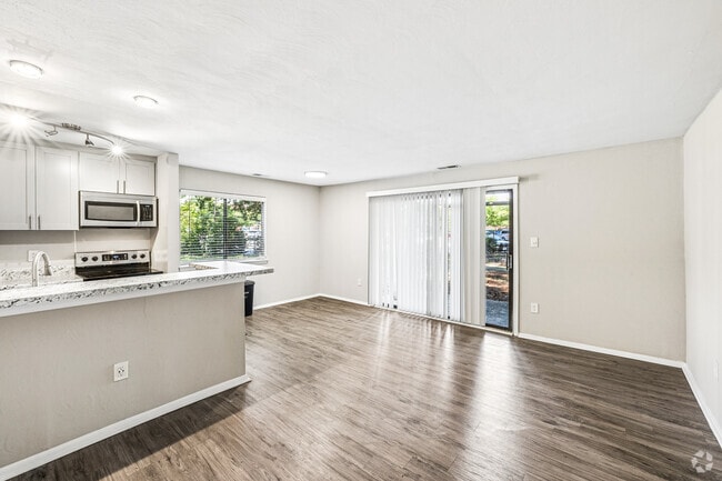 Odessey - 1BR, 1BA - 732SF - Living Room - Compass at City Center