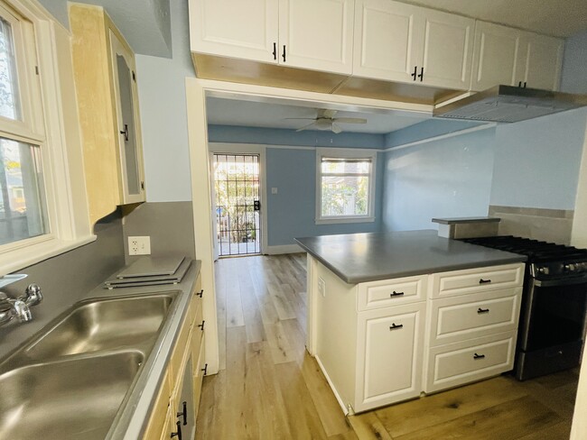 Kitchen to Bathroom from Mud Room - 1712 E 8th St