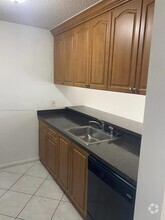 Building Photo - 8560 N Sherman Cir