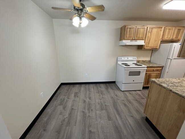 Building Photo - Fully Renovated Unit with a Walk Out Deck!! Ground Level Two Bedroom Apartment Available Now!
