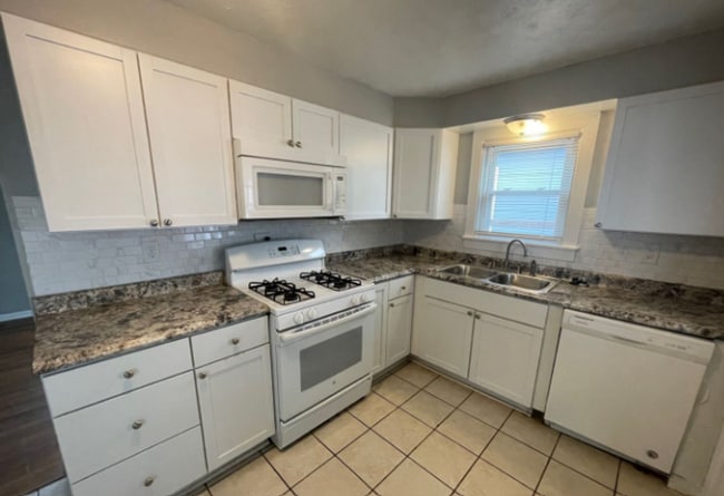 Photo - Charming 2BR Home with 1-Car Attached Garage, Hardwood Floor, and Washer/Dryer Provided!