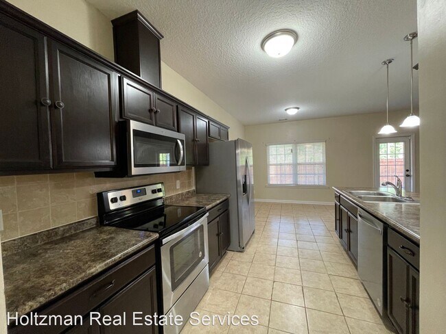 Foto del edificio - 4 br, 2.5 bath House - 1322 Windrow Drive