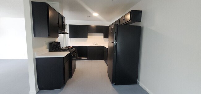 Foto del edificio - 6940 Hopkins Dr