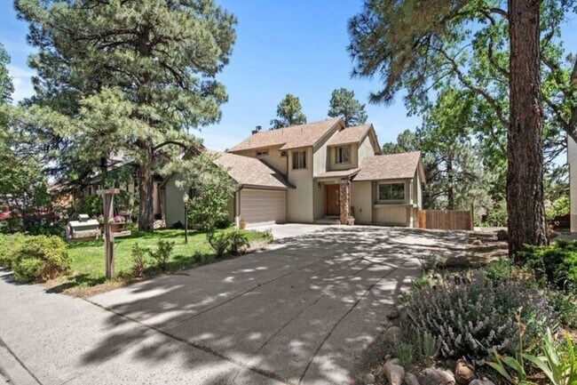 Two car garage and off-street parking - 2677 E Matterhorn Dr