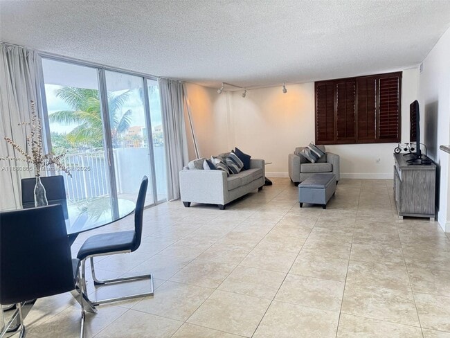 Building Photo - 5838 Collins Ave