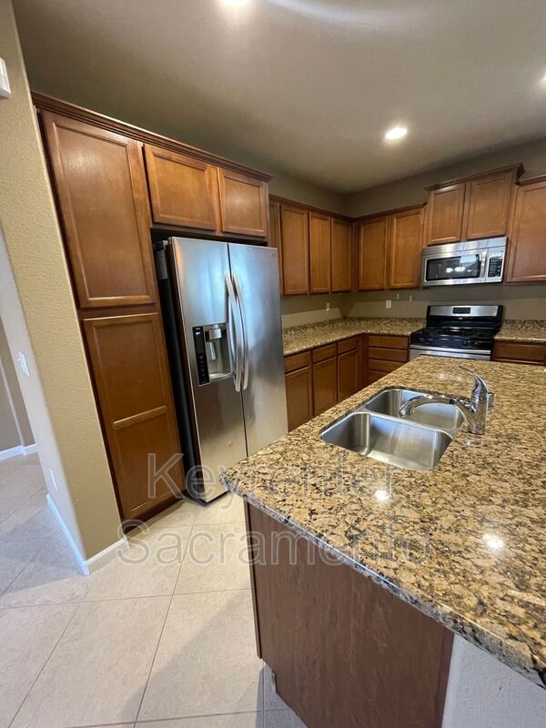 Building Photo - 6115 Passiflora Ln
