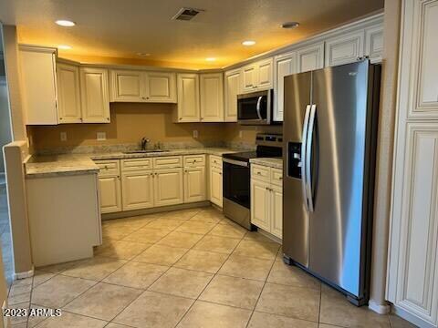 Building Photo - 9555 E Raintree Dr