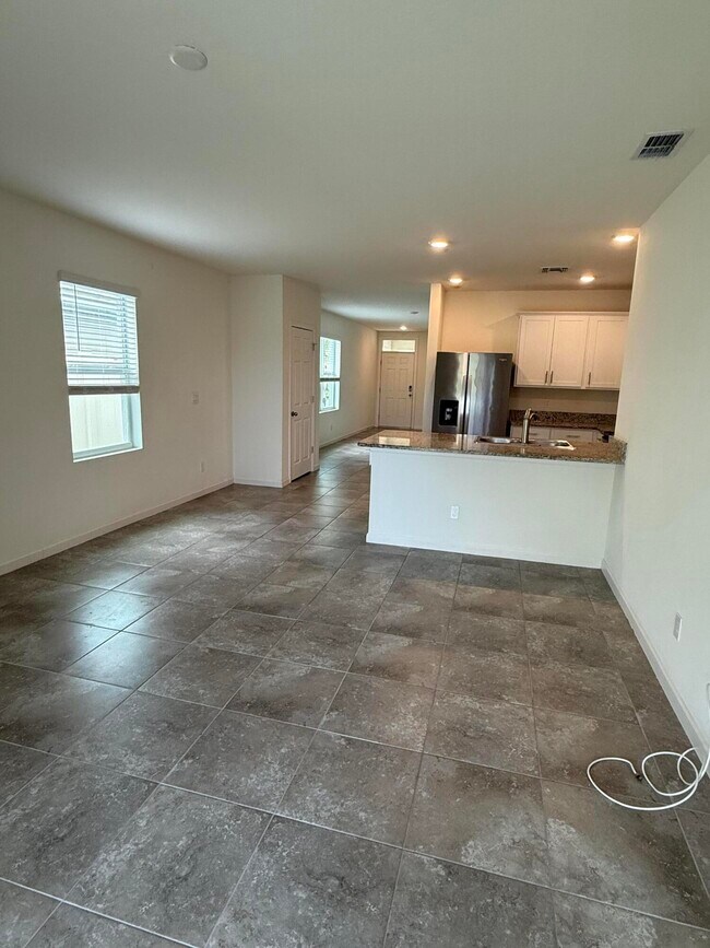 Building Photo - 10997 SW Vasari Way