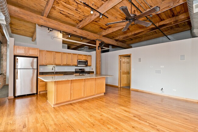 Building Photo - This two bedroom, two bathroom brick expos...