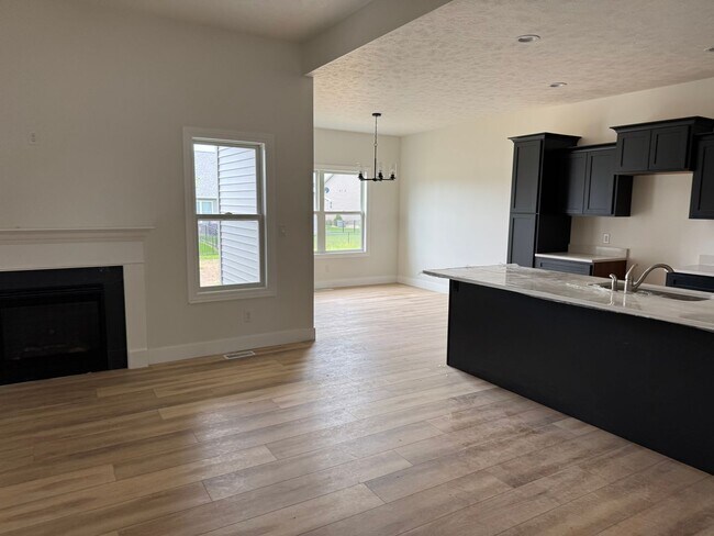 Building Photo - New Construction! West side location. 4br, 3bth, 2crg, Finished basement. All new stainless steel...