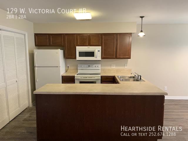 Foto del edificio - "Charming 2-Bed, 2-Bath Condo with Cozy Fi...