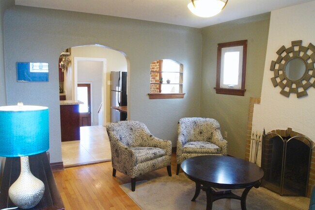 Arched doorways and built in shelves add to the historic character. - 3894 Meade St