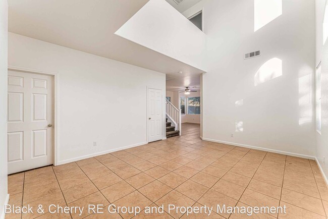 Building Photo - 5 br, 2.5 bath House - 8020 Glowing Water St.