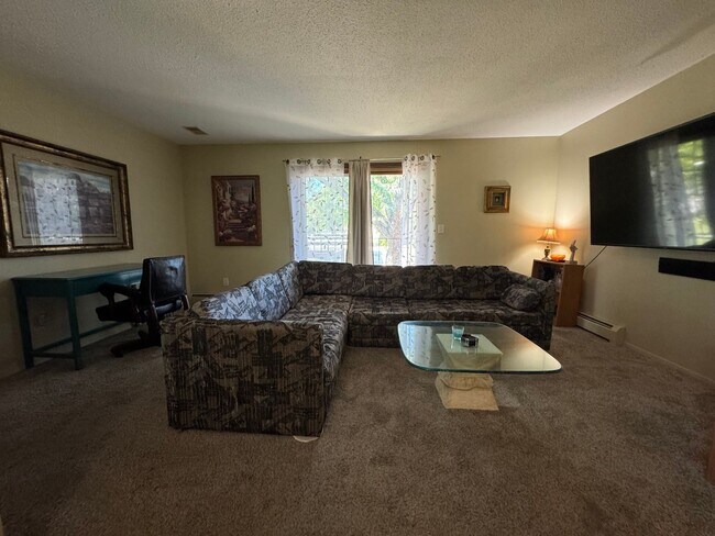 Foto del edificio - 2BR Condo Near Empire Mall with Garage, Pool & Easy Interstate Access!