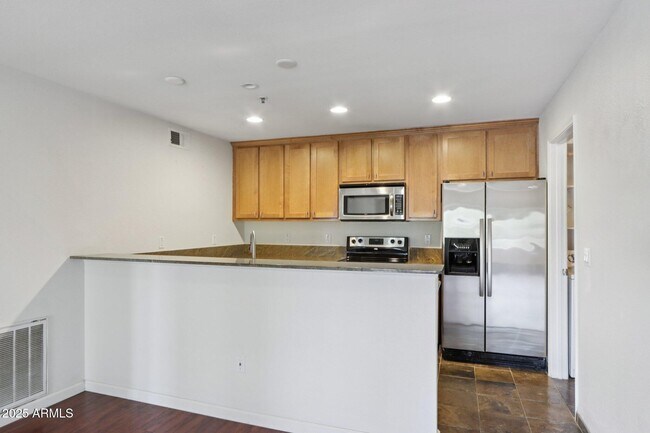 Foto del edificio - 4704 E Paradise Village Pkwy N