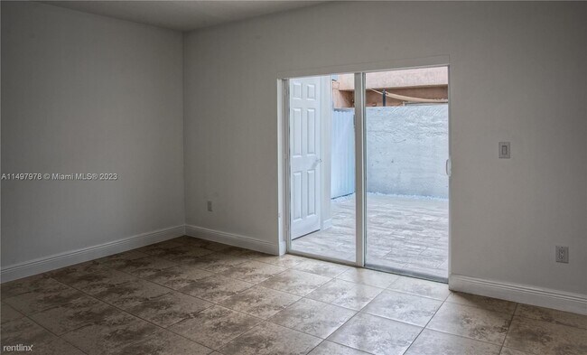 Foto del edificio - 3 br, 2 bath House - 8390 NW 103rd St Apt ...