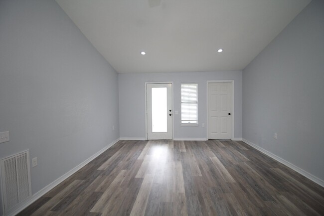 Building Photo - Updated Fox Hollow 3BR Home Near 9 Mile Rd with LVP Flooring, Granite Kitchen, 2-Car Garage & Fen...