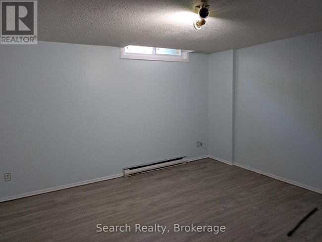 Photo du bâtiment - 311-311 Vesta Rd