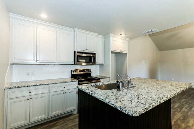 Building Photo - Half Off First Full Month's Rent! A Premie...