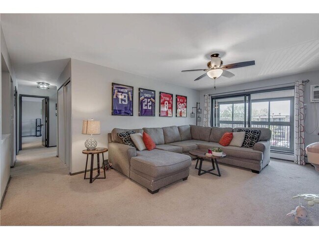 Building Photo - Stylish Eagan Condo w/ Private Balcony, Underground Parking, Updated Kitchen and More!!!