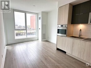 Building Photo - 1-421 Belsize Dr