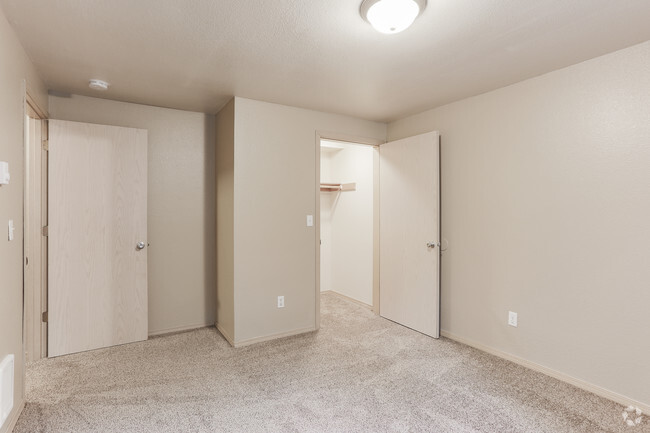 Both bedrooms in the 2x1 models have massive walk in closets with lighting fixtures included! - Overlook Pointe Apartments