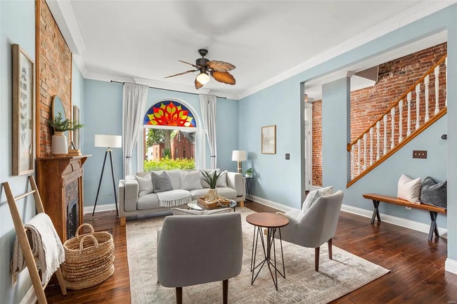 Living Room w/ Original Stained Glass Window - 3137 Arsenal St
