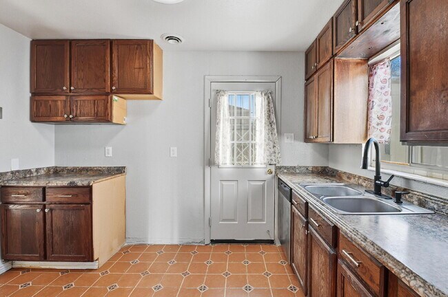 Building Photo - $1,930.95 - 3 Bedrooms, 1 Bathroom, Single Family Home in Aurora with fenced Yard!