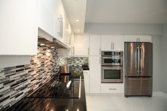 Building Photo - 9801 Collins Ave