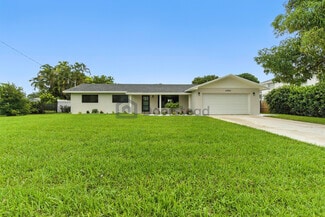 Building Photo - 6886 Tradewind Way