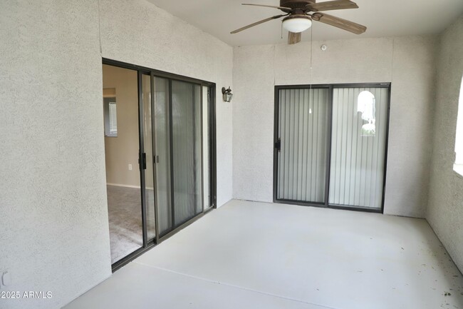 Building Photo - 9555 E Raintree Dr