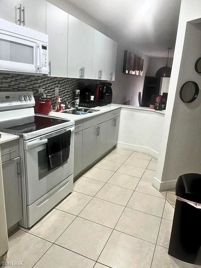 Foto del edificio - 4 br, 2.5 bath House - 6345 W 27th Ln # 10...