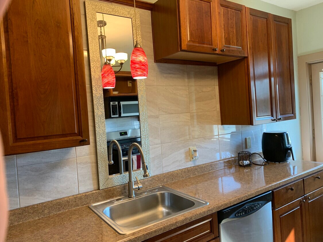 Cherry Wood Cabinets - 125 Broadway St