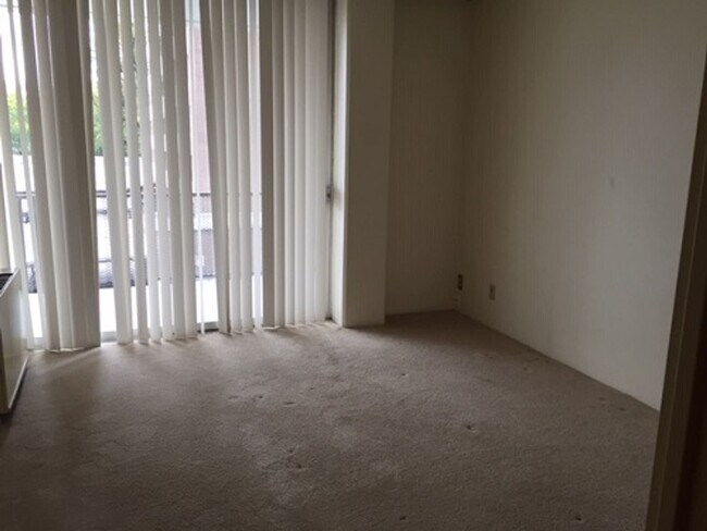 Building Photo - Secure One-Bedroom Condo Near CSU with Premium Community Amenities