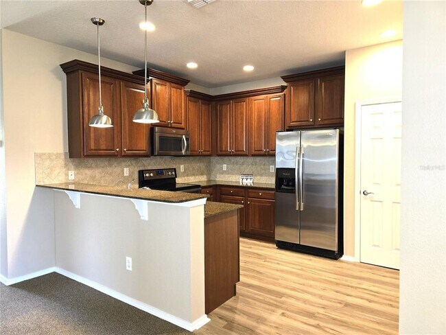 Foto del edificio - 5646 Sunset Falls Dr