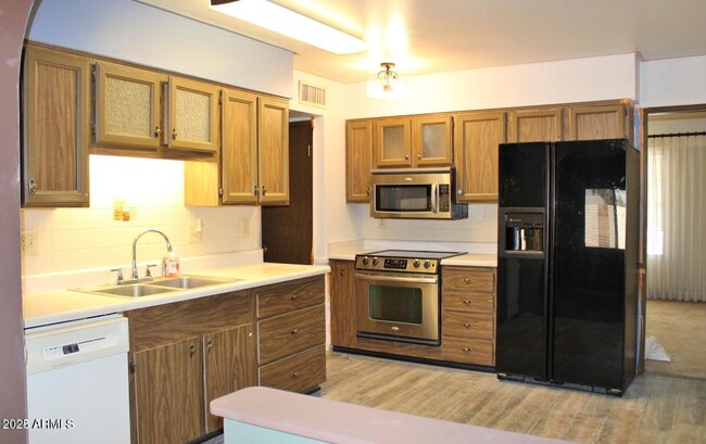 Foto del edificio - 9814 W Azalea Ct