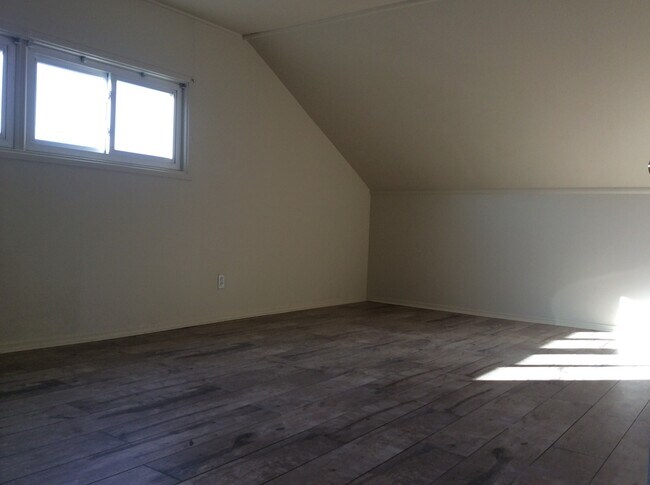 Building Photo - Four bedroom two bath expanded home