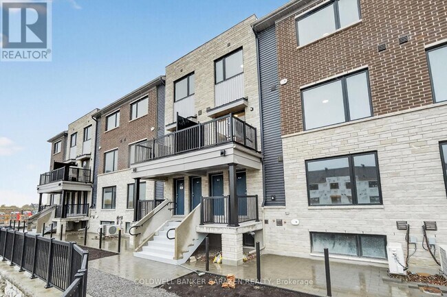 Photo du bâtiment - 801 Glenroy Gilbert Dr